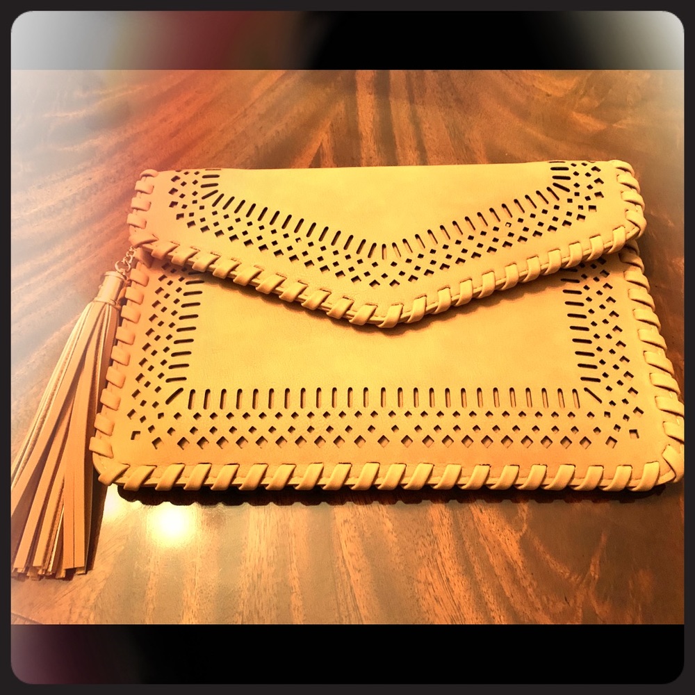 Cute clutch with removable cross body strap